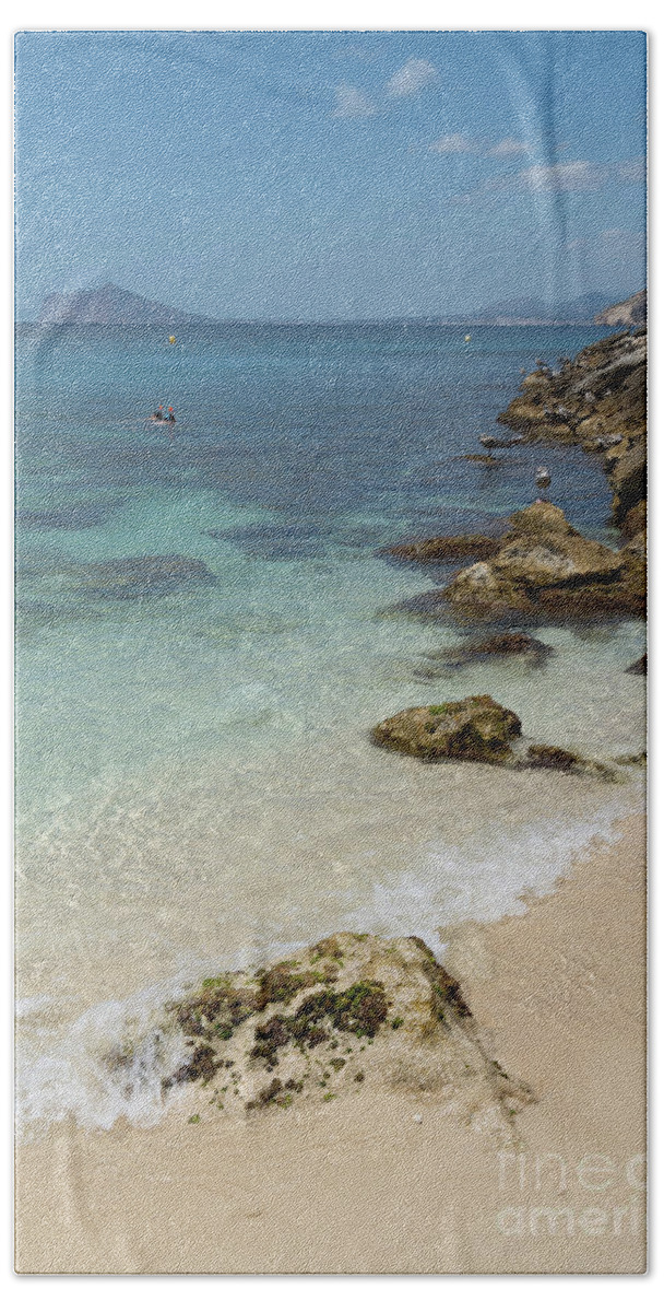 Mediterranean Bath Towel featuring the photograph Turquoise blue sea water and rocks in Calpe 3 by Adriana Mueller