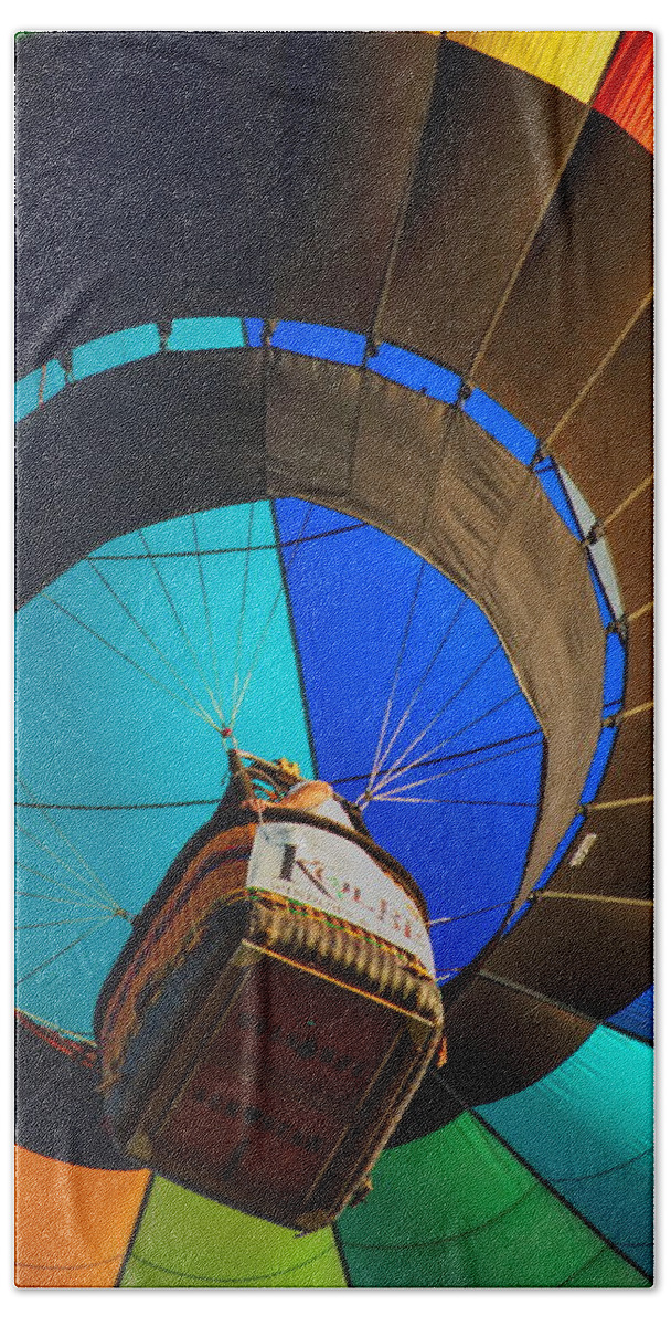 Wausau Bath Towel featuring the photograph Underneath A Rainbow Colored Hot Air Balloon by Dale Kauzlaric