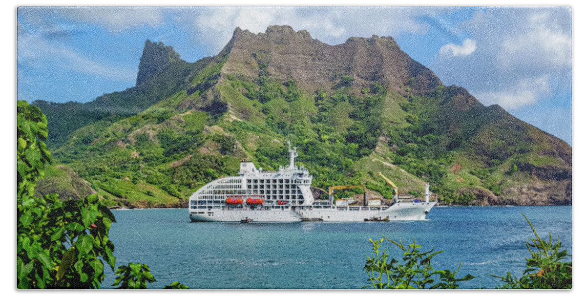 Freighter Bath Towel featuring the photograph Vessel anchored in Puamau Bay, Hiva Oa, Marquesas Islands by Lyl Dil Creations