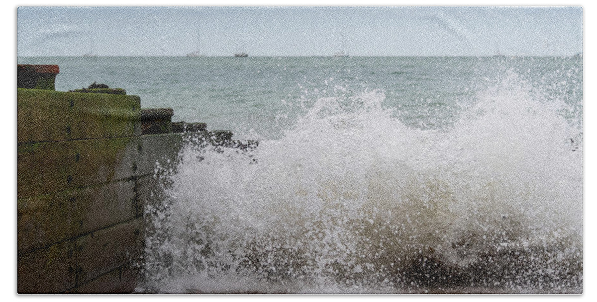 Eastbourne Hand Towel featuring the photograph Wave splash by Andrew Lalchan
