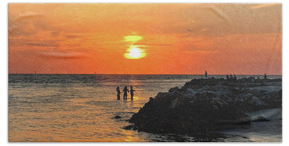 Clearwater Beach Sunset Bath Towel featuring the photograph When The Sun Goes Down by Kerri Farley
