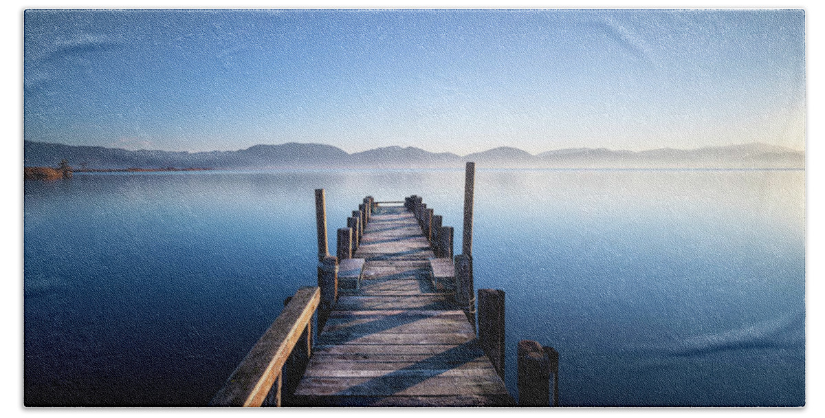 Lake Hand Towel featuring the photograph Pier in a Blue Lake by Stefano Orazzini