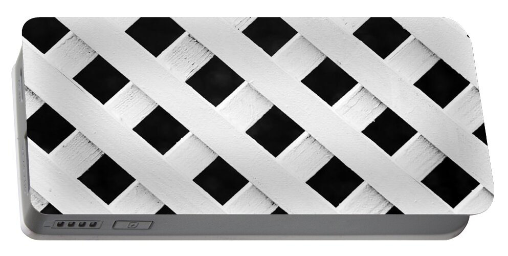 Fence Portable Battery Charger featuring the photograph Lattice Fence Pattern by Mikel Martinez de Osaba