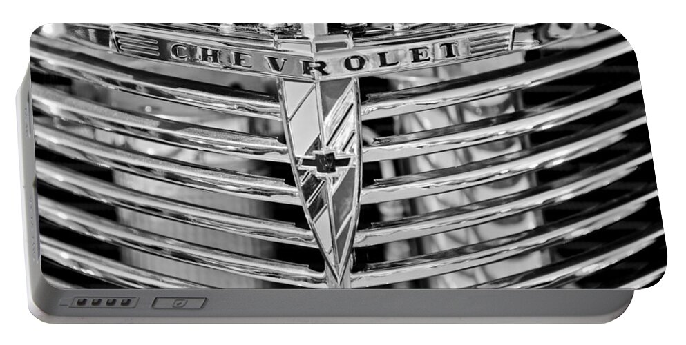 1939 Chevrolet Coupe Grille Emblem Portable Battery Charger featuring the photograph 1939 Chevrolet Coupe Grille Emblem by Jill Reger
