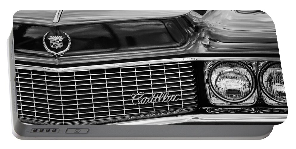 1969 Cadillac Eldorado Grille Portable Battery Charger featuring the photograph 1969 Cadillac Eldorado Grille by Jill Reger