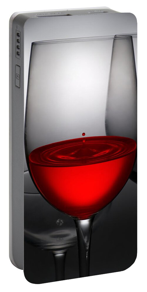 Abstract Portable Battery Charger featuring the photograph Drops Of Wine In Wine Glasses #1 by Setsiri Silapasuwanchai