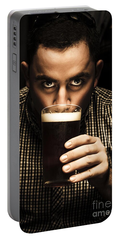 Beer Portable Battery Charger featuring the photograph Irish man drinking beer on St Patricks Day #1 by Jorgo Photography