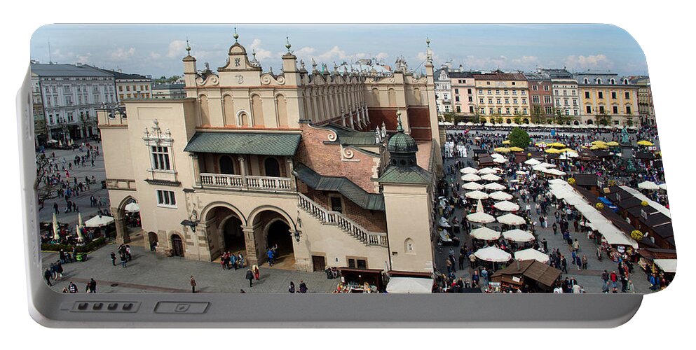 Celebration Portable Battery Charger featuring the photograph Krakow Poland Main Square #1 by Greg Ochocki