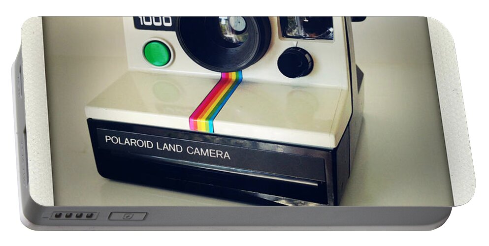 Nobody Portable Battery Charger featuring the photograph Polaroid camera. #1 by Les Cunliffe