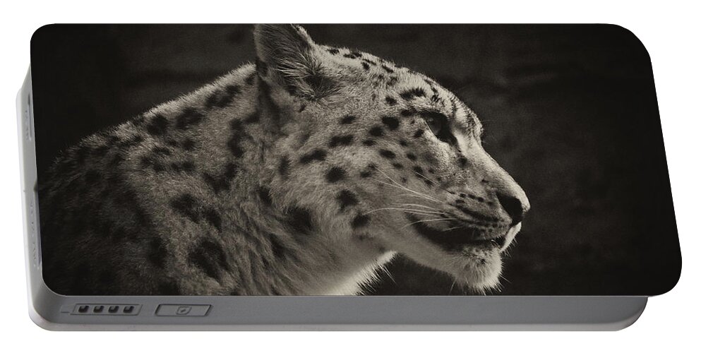 Marwell Portable Battery Charger featuring the photograph Profile of a Snow Leopard #1 by Chris Boulton