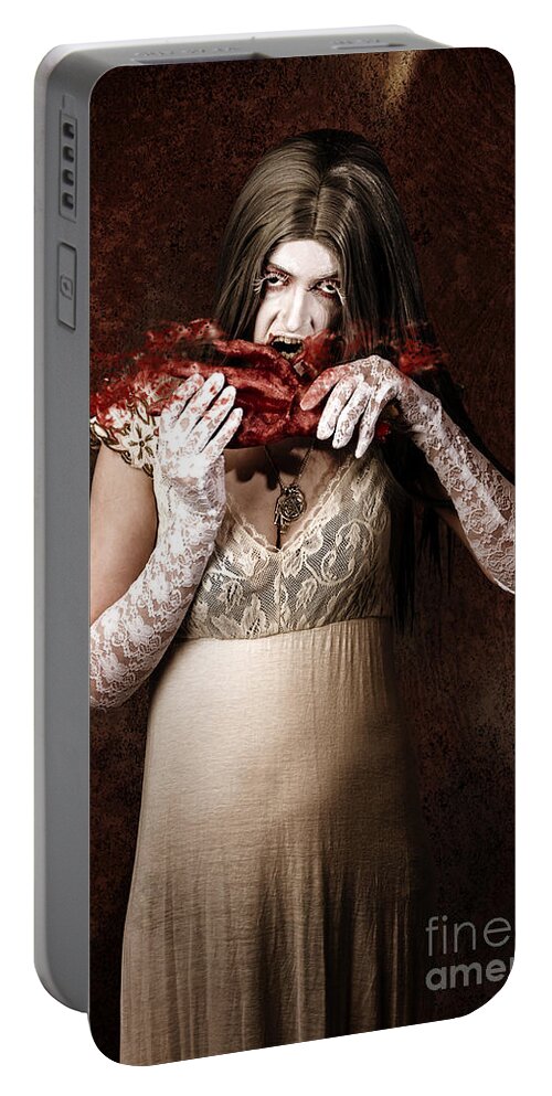 Blood Portable Battery Charger featuring the photograph Zombie vampire woman eating human hand #1 by Jorgo Photography