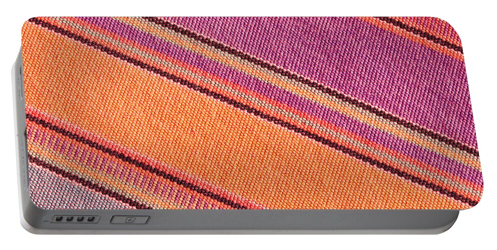 Abstract Portable Battery Charger featuring the photograph Colorful cloth #2 by Tom Gowanlock