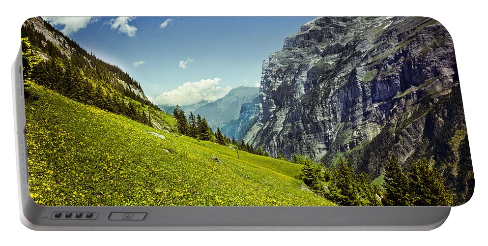 Alpine Portable Battery Charger featuring the photograph Lauterbrunnen Valley in Bloom by Jeff Goulden