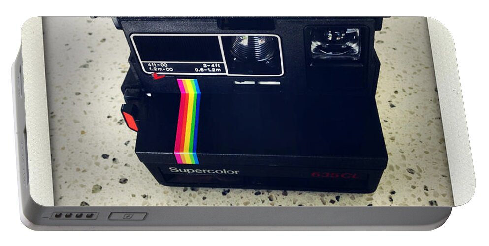Nobody Portable Battery Charger featuring the photograph Polaroid camera. #2 by Les Cunliffe