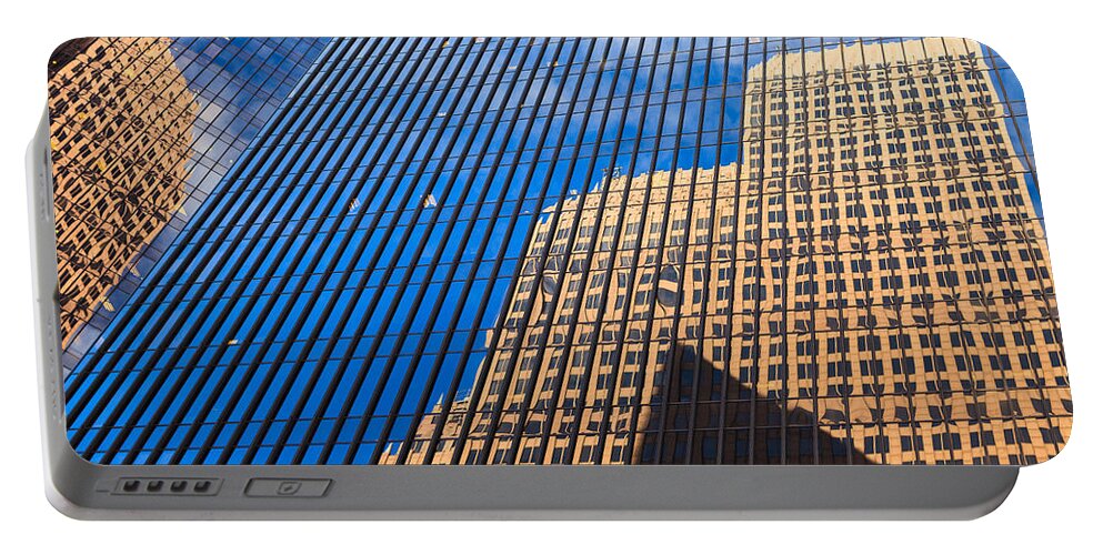 Architecture Portable Battery Charger featuring the photograph Reflections by Raul Rodriguez