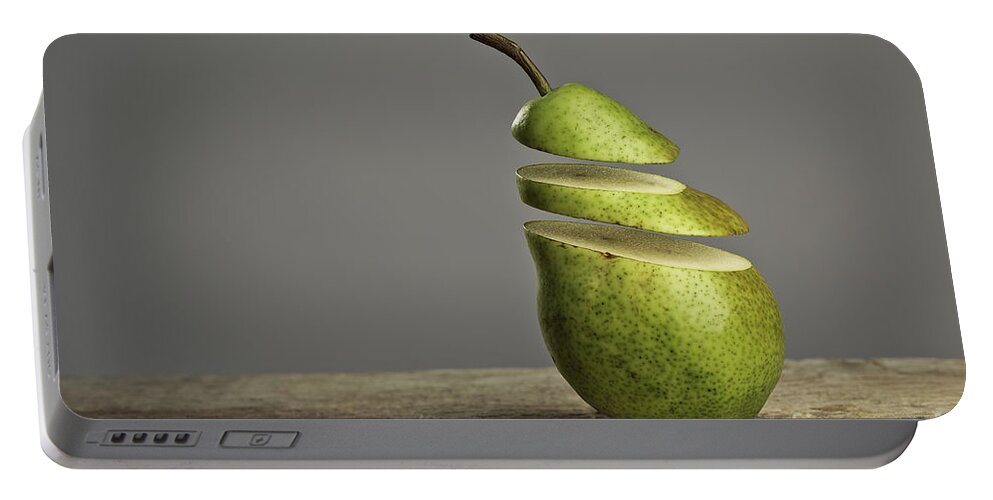 Pear Portable Battery Charger featuring the photograph Sliced #2 by Nailia Schwarz