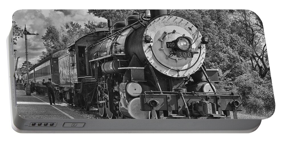 Brakeman Portable Battery Charger featuring the photograph The Brakeman by Robert Frederick