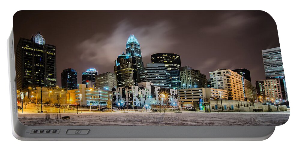 Charlotte Portable Battery Charger featuring the photograph Charlotte Queen City Skyline Near Romare Bearden Park In Winter Snow #6 by Alex Grichenko