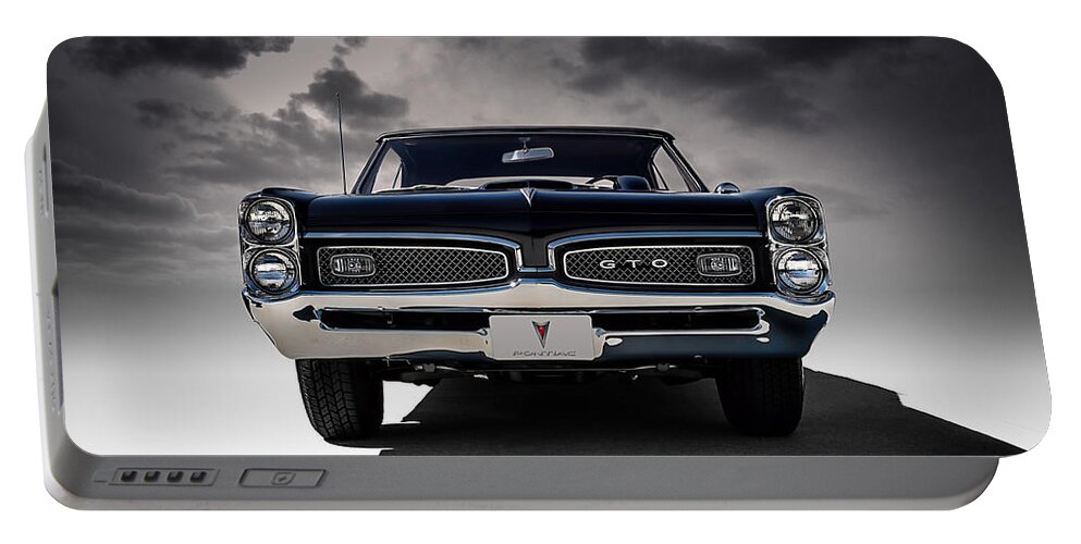 Transportation Portable Battery Charger featuring the digital art '67 Gto #67 by Douglas Pittman