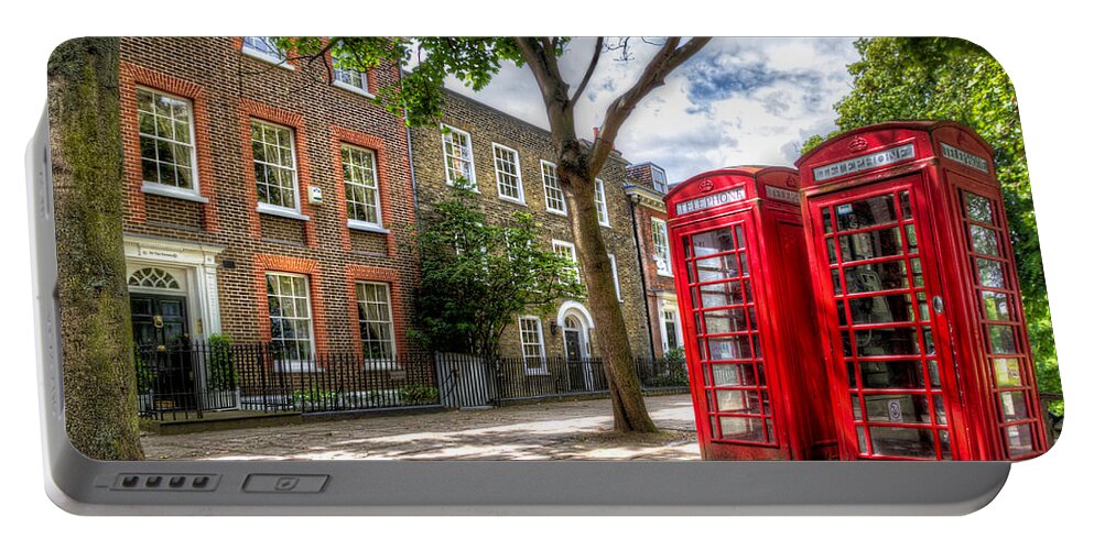 Europe Portable Battery Charger featuring the photograph A Pair of Red Phone Booths by Tim Stanley