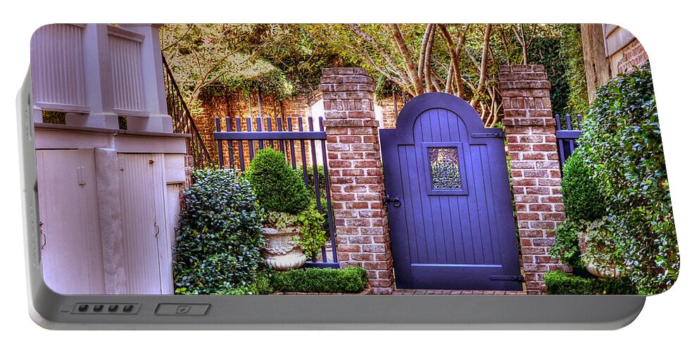 Garden Portable Battery Charger featuring the photograph A Private Garden In Charleston by Kathy Baccari