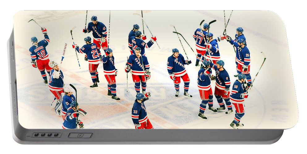 Hockey Portable Battery Charger featuring the photograph A Winning Salute by Karol Livote