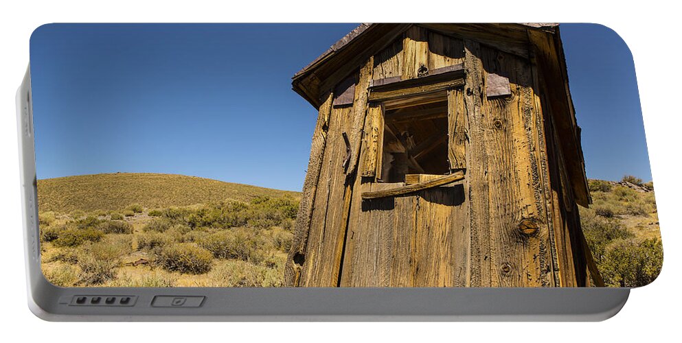 Bodi Portable Battery Charger featuring the photograph Abandoned Outhouse by Bryant Coffey