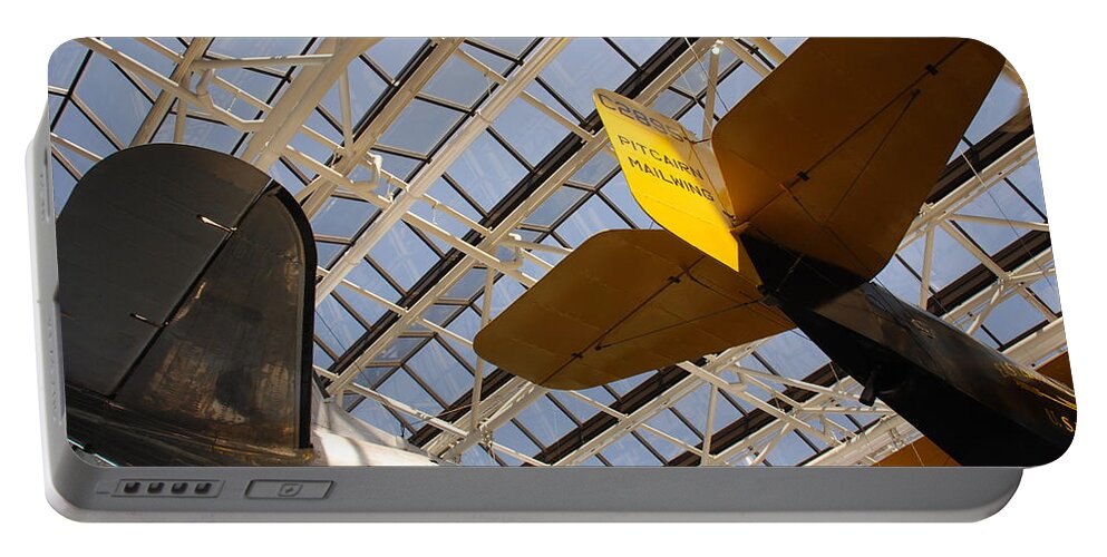 Planes Portable Battery Charger featuring the photograph Airplane Rudders by Kenny Glover