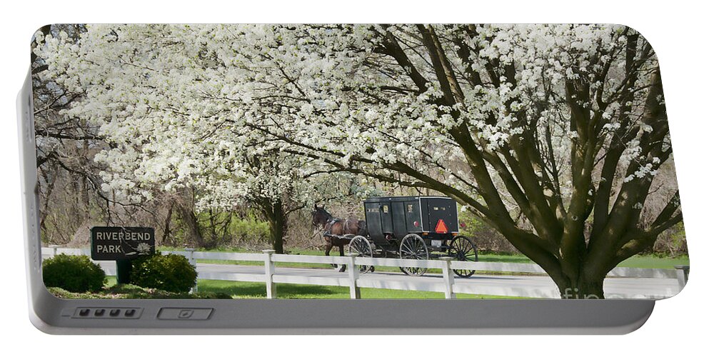Spring Portable Battery Charger featuring the photograph Amish Buggy Fowering Tree by David Arment