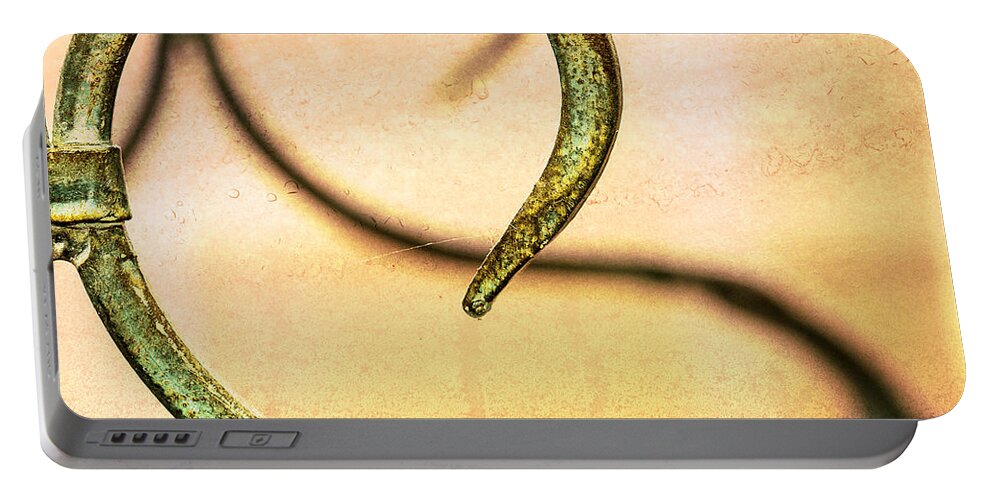 Contour Portable Battery Charger featuring the photograph An Echoed Spiral by Jon Woodhams