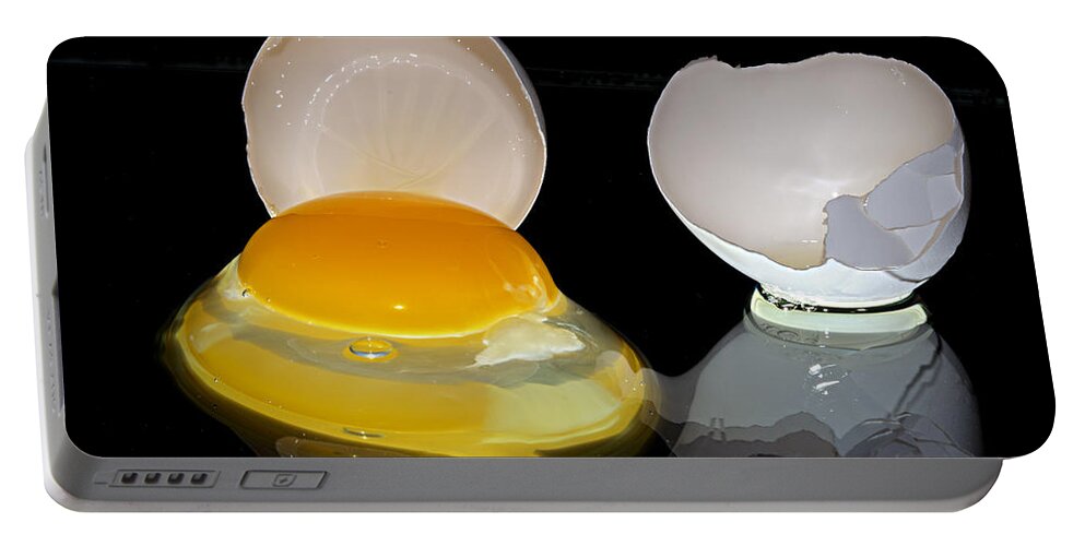 Egg Portable Battery Charger featuring the photograph An Egg by Phyllis Denton
