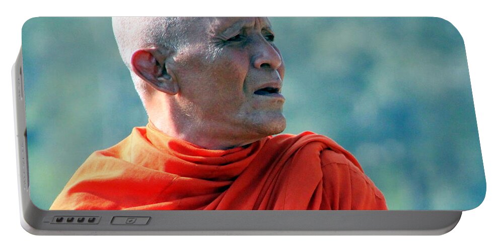 Monk Portable Battery Charger featuring the photograph An Elder Buddhist Monk at Angkor Wat by Laurel Talabere