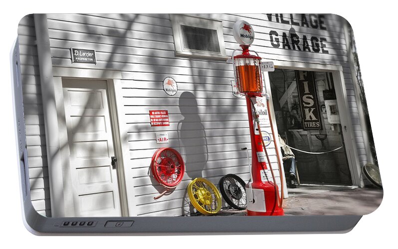 Garage Portable Battery Charger featuring the photograph An old village gas station by Mal Bray