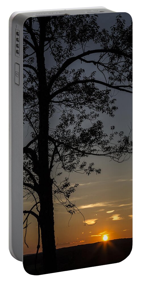 Sunset Portable Battery Charger featuring the photograph As The Sun Fades Behind The Mountian by Karol Livote