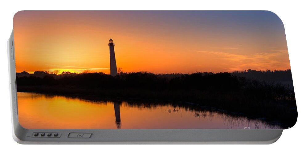 Landscape Portable Battery Charger featuring the photograph As The Sun Sets and The Water Reflects by Michael Ver Sprill