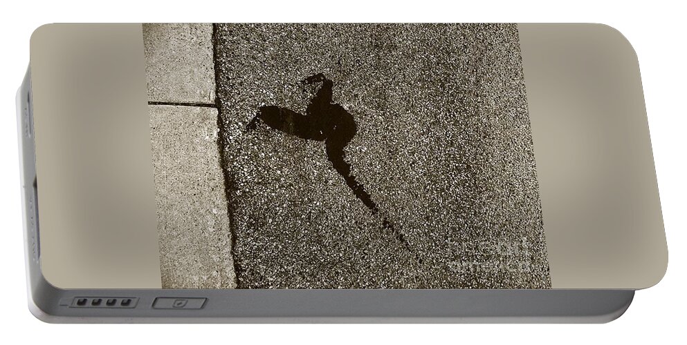 Natural Theme Portable Battery Charger featuring the photograph Asphalt writing- The Bird by Fei A