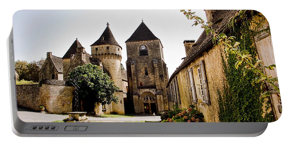 Saint Genies Portable Battery Charger featuring the photograph Asymmetric Tower and church of Saint Genies Perigord by Weston Westmoreland