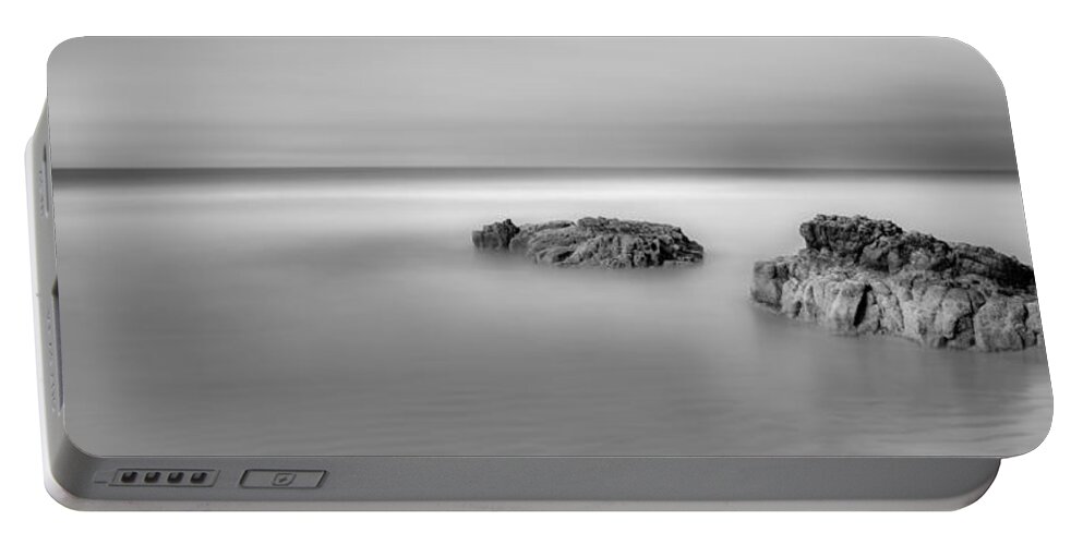 Atlantic Portable Battery Charger featuring the photograph Little rocks off Downhill by Nigel R Bell