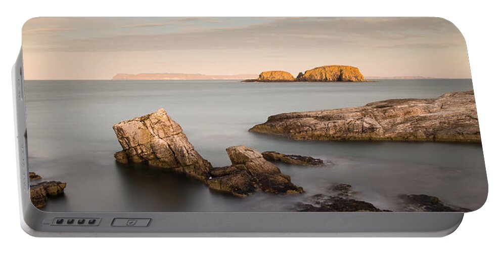 Sheep Island Portable Battery Charger featuring the photograph Ballintoy Bay by Nigel R Bell