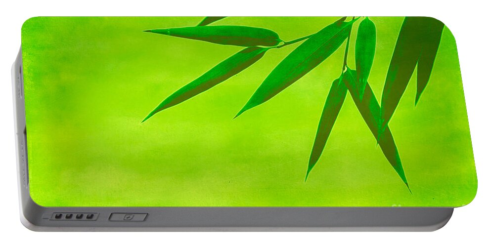 Asia Portable Battery Charger featuring the photograph Bamboo Leaves by Hannes Cmarits
