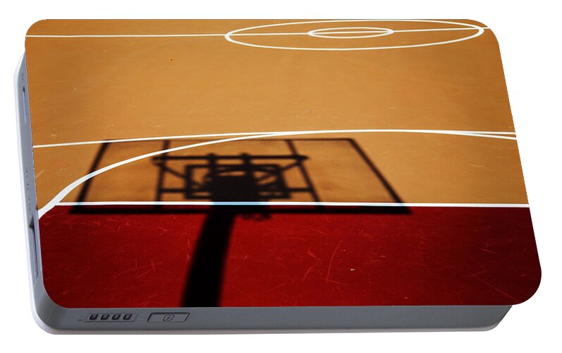 Basketball Portable Battery Charger featuring the photograph Basketball Shadows by Karol Livote