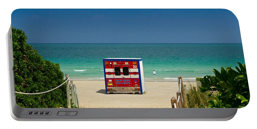 Florida Portable Battery Charger featuring the photograph Beach Shelter with Fire Truck Theme by Les Palenik