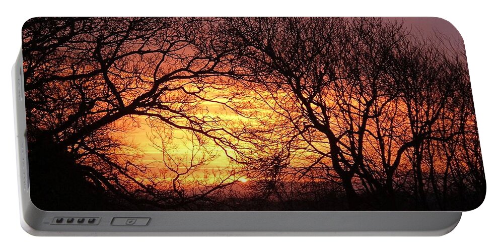 Sunrise Portable Battery Charger featuring the photograph Fiery Dawn Trees by Richard Brookes