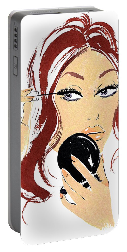 20-25 Portable Battery Charger featuring the photograph Beautiful Woman Applying Mascara by Ikon Ikon Images