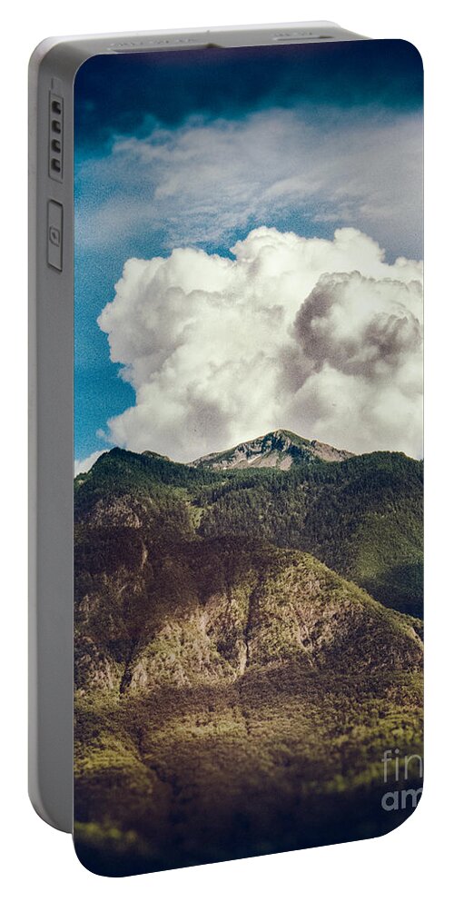 Alps Portable Battery Charger featuring the photograph Big clouds over the Alps by Silvia Ganora