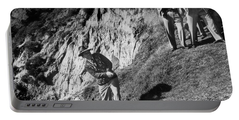 Bing Crosby Portable Battery Charger featuring the photograph Bing Crosby playing in the rough at Pebble Beach circa 1958 by Monterey County Historical Society