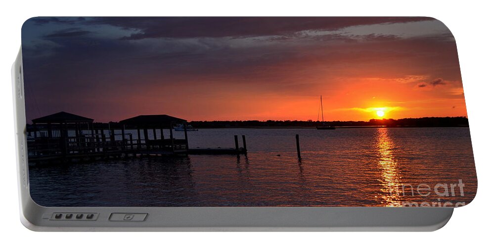 Sunset Portable Battery Charger featuring the photograph Boat House Sunset by Amy Lucid