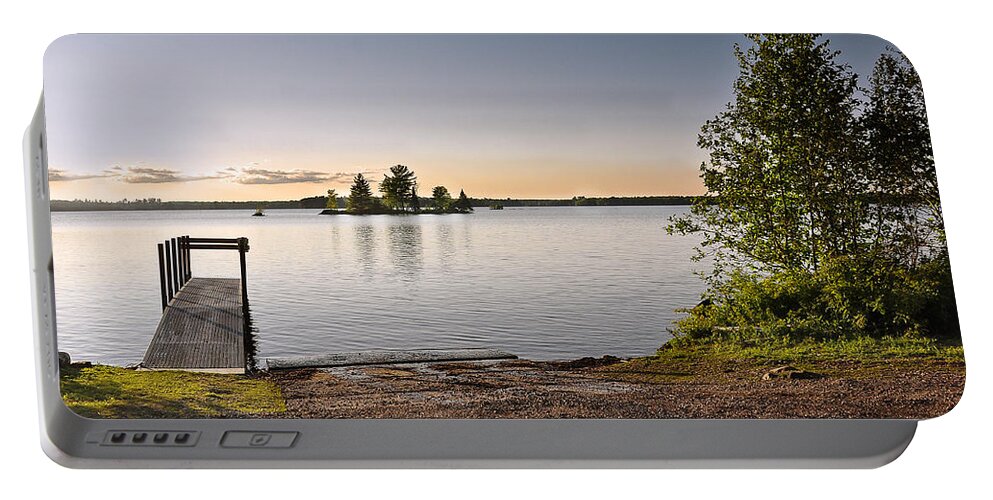 Boat Landing Portable Battery Charger featuring the photograph Boat Landing by Gwen Gibson
