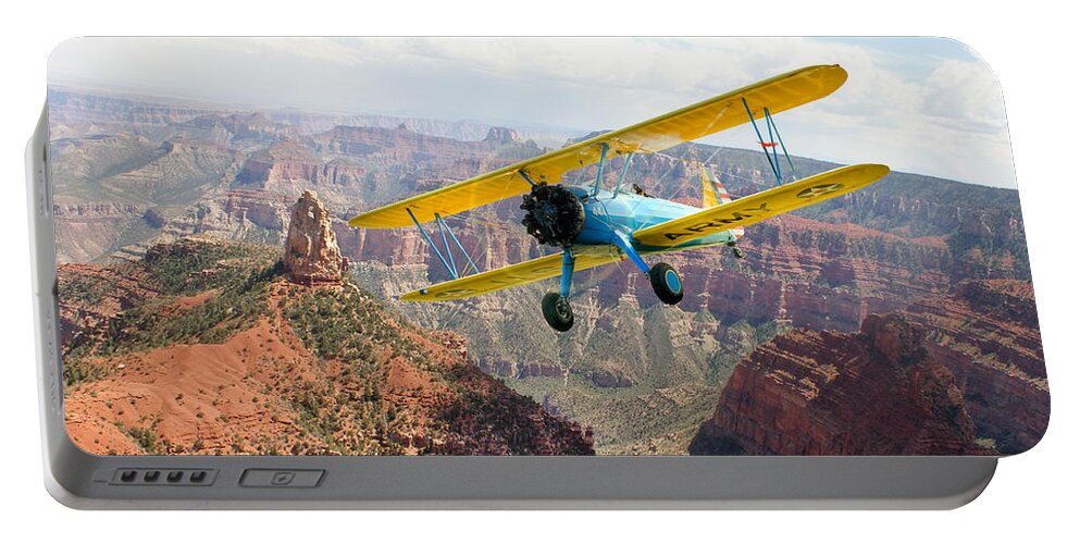 Boeing Stearman Portable Battery Charger featuring the photograph Boeing Stearman at Mount Hayden Grand Canyon by Gary Eason
