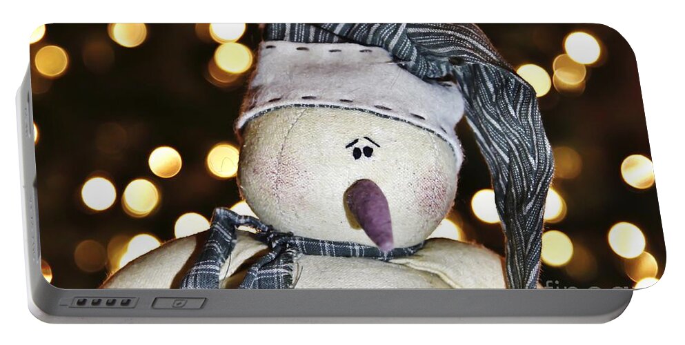 Maine Portable Battery Charger featuring the photograph Bokeh Snowman by Karin Pinkham